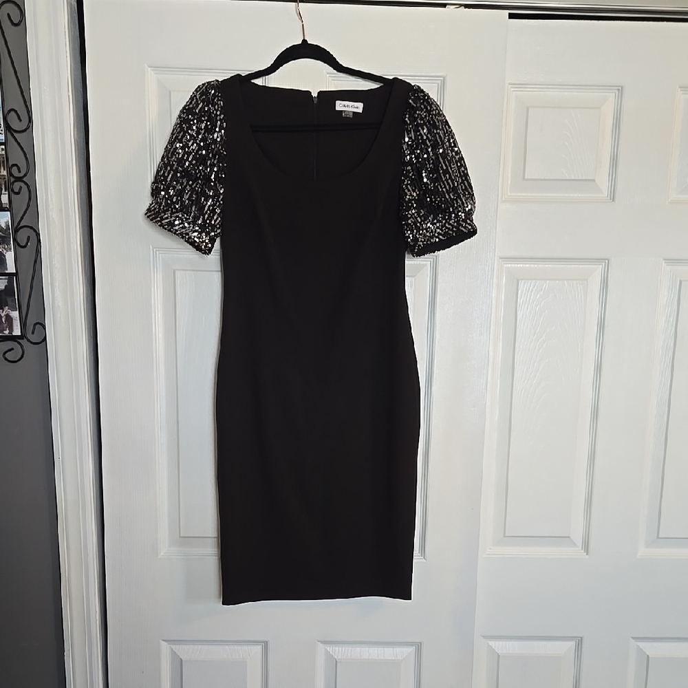 Elegant Black Dress with Patterned Sleeves